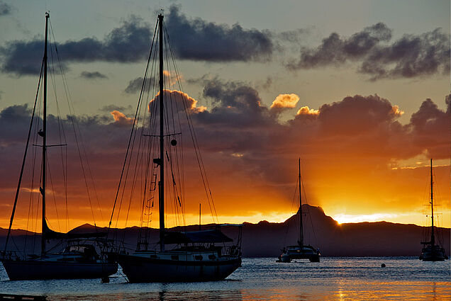 Sunset with sailing boat in Savusavu