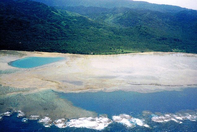 The blue swimming lagoon at SigaSiga Sands Resort